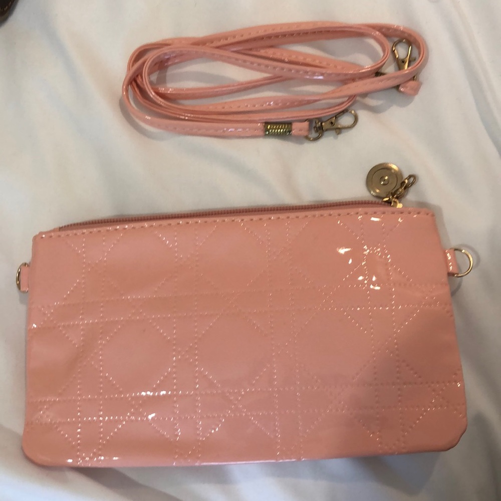 Pink pouch with strap